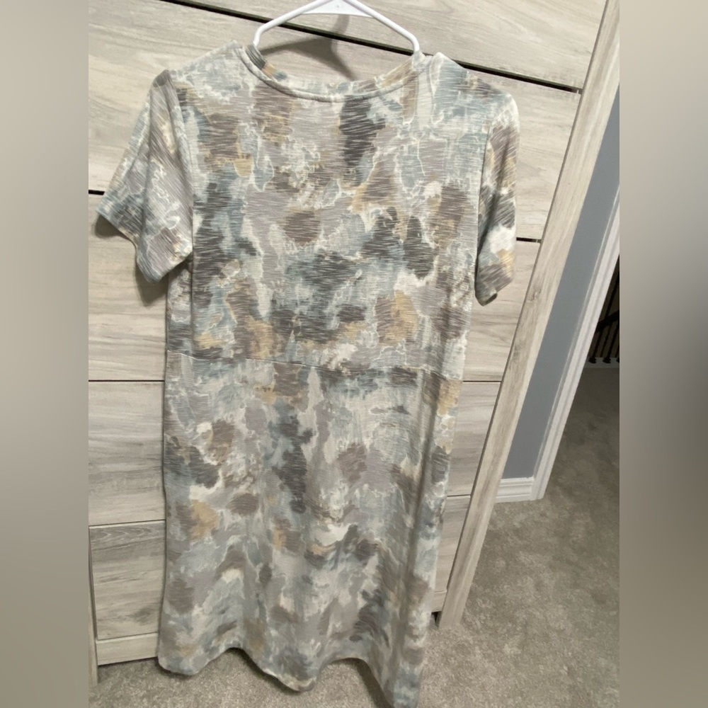 I’m am selling a LOGO by Lori Goldstein dress.